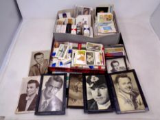 A tray of a large quantity of cigarette and tea cards,