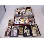 A tray of a large quantity of cigarette and tea cards,