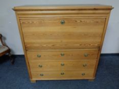 A 19th century pine secretaire chest CONDITION REPORT: Upper section locked and