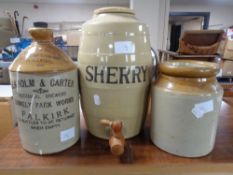 A glazed earthen ware lidded sherry barrel with tap,