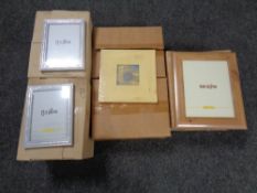 Five boxes of Fotolijst 10 cm x 10 cm photo frames,