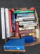 A box of hardback books including coffee table atlas, works of Shakespeare,