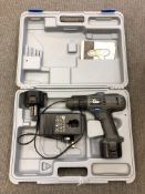 An Elu cordless drill with battery and charger in case