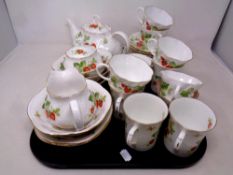 A thirty two piece Ringtons Virginia Strawberry tea service and a Royal Worcester strawberries