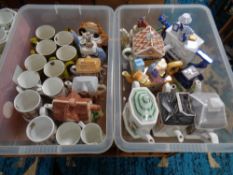 Two crates of novelty teapots : Ringtons, mugs, floral trellis,