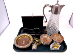 A tray of cut glass and silver plated claret jug, Waterford crystal clock, horse brasses,