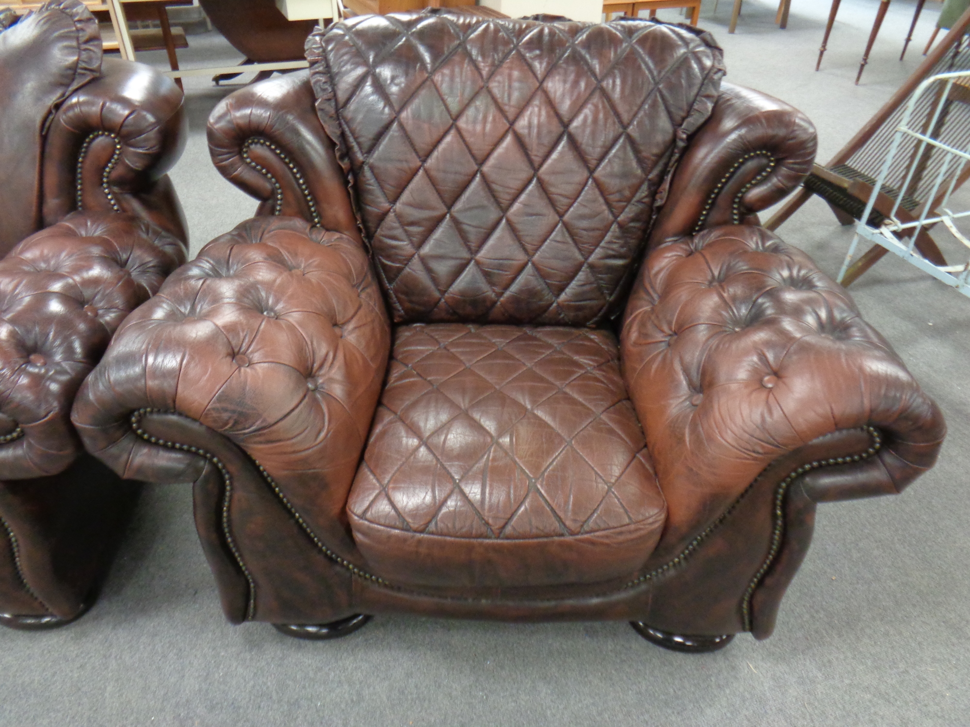 An Italian Rubelli three piece brown leather Chesterfield suite comprising two seater settee and - Image 2 of 2