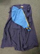 An academic gown by Ede & Ravenscroft Limited of London,