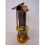 A reproduction E William Thomas brass miners lamp