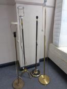 Four 20th century brass floor lamps (continental wiring)