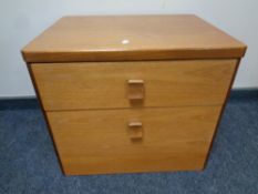 A 20th century Stag teak two drawer bedside chest