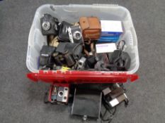 Crate of assorted vintage cameras, cine cameras,