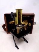 An early 20th century F Koristka of Milano brass and black lacquered microscope number 33275,