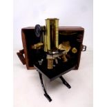 An early 20th century F Koristka of Milano brass and black lacquered microscope number 33275,