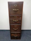 An early 20th century wooden four drawer filing cabinet CONDITION REPORT: 41cm wide