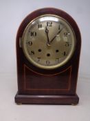 An Edwardian inlaid mahogany bracket clock with silvered dial