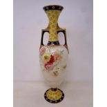 An antique Royal Doulton transfer printed twin handled vase with gilding. Height 31.