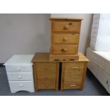 Four contemporary three drawer bedside chests