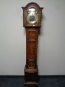 An oak cased Tempus Fugit granddaughter clock