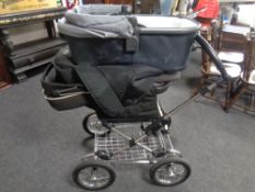 A Silver Cross pram,