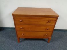 A mid 20th century teak three drawer bedroom chest
