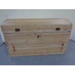 An antique pine domed topped shipping trunk CONDITION REPORT: as found