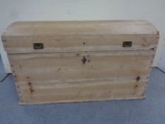 An antique pine domed topped shipping trunk CONDITION REPORT: as found