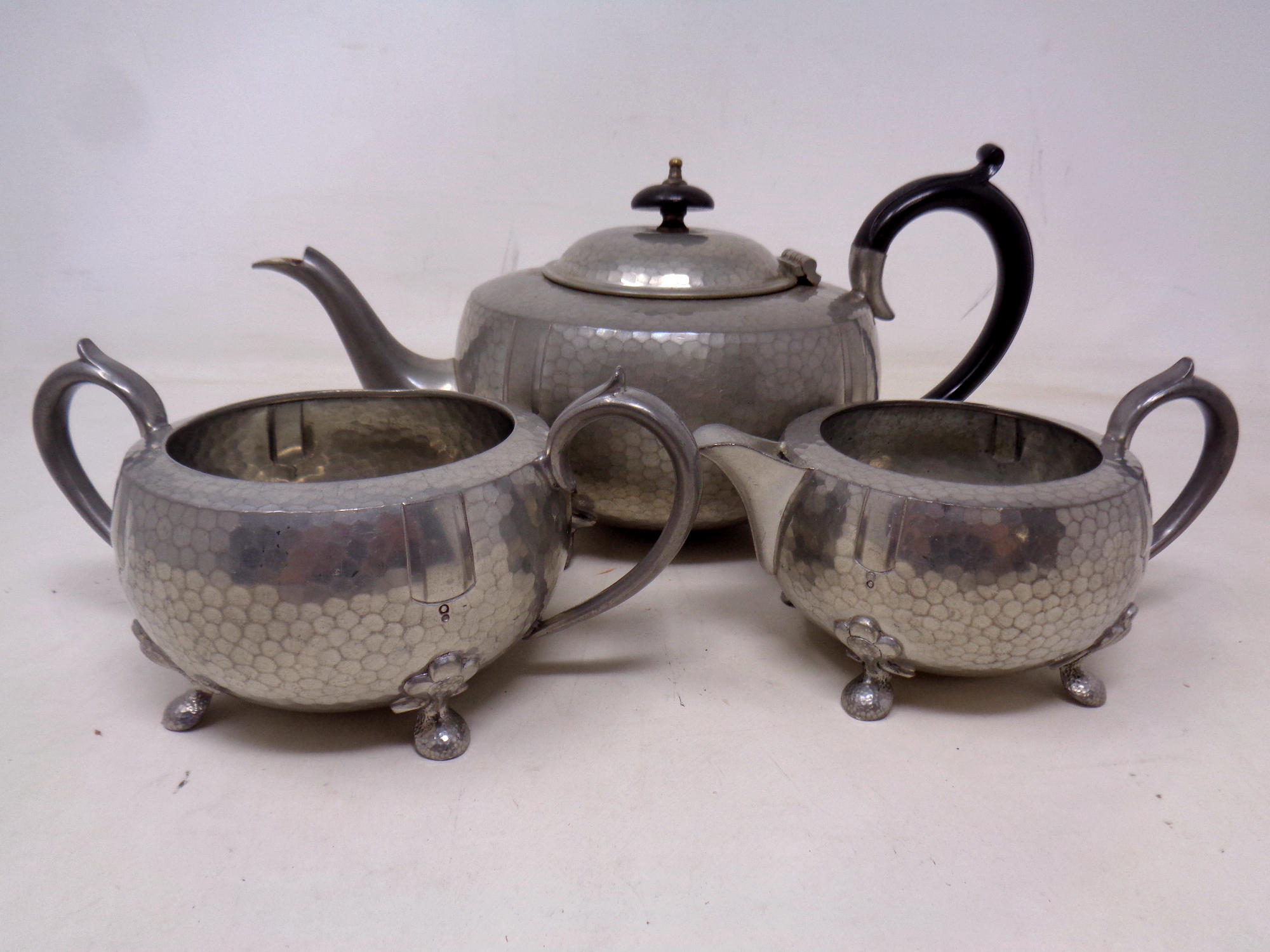 A three piece Mayflower English pewter tea service