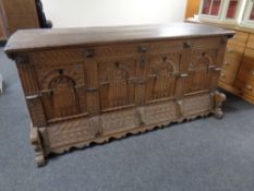 An 18th century continental heavily carved oak cassone