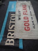 Two 20th century cigarette advertisement banners - Wills Gold Flake and Bristol Tipped Cigarettes