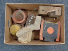 A box of industrial wooden moulds