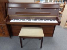 A Bentley overstrung mahogany cased mini piano with stool