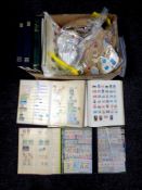 A box of stamp albums containing world stamps to include Gabon, Japan, The Caribbean,