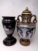 A 19th century hand painted black glass vase together with a further black and gilt ceramic vase