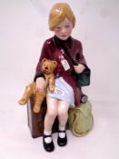 A Royal Doulton figure - The Girl Evacuee, HN 3203,