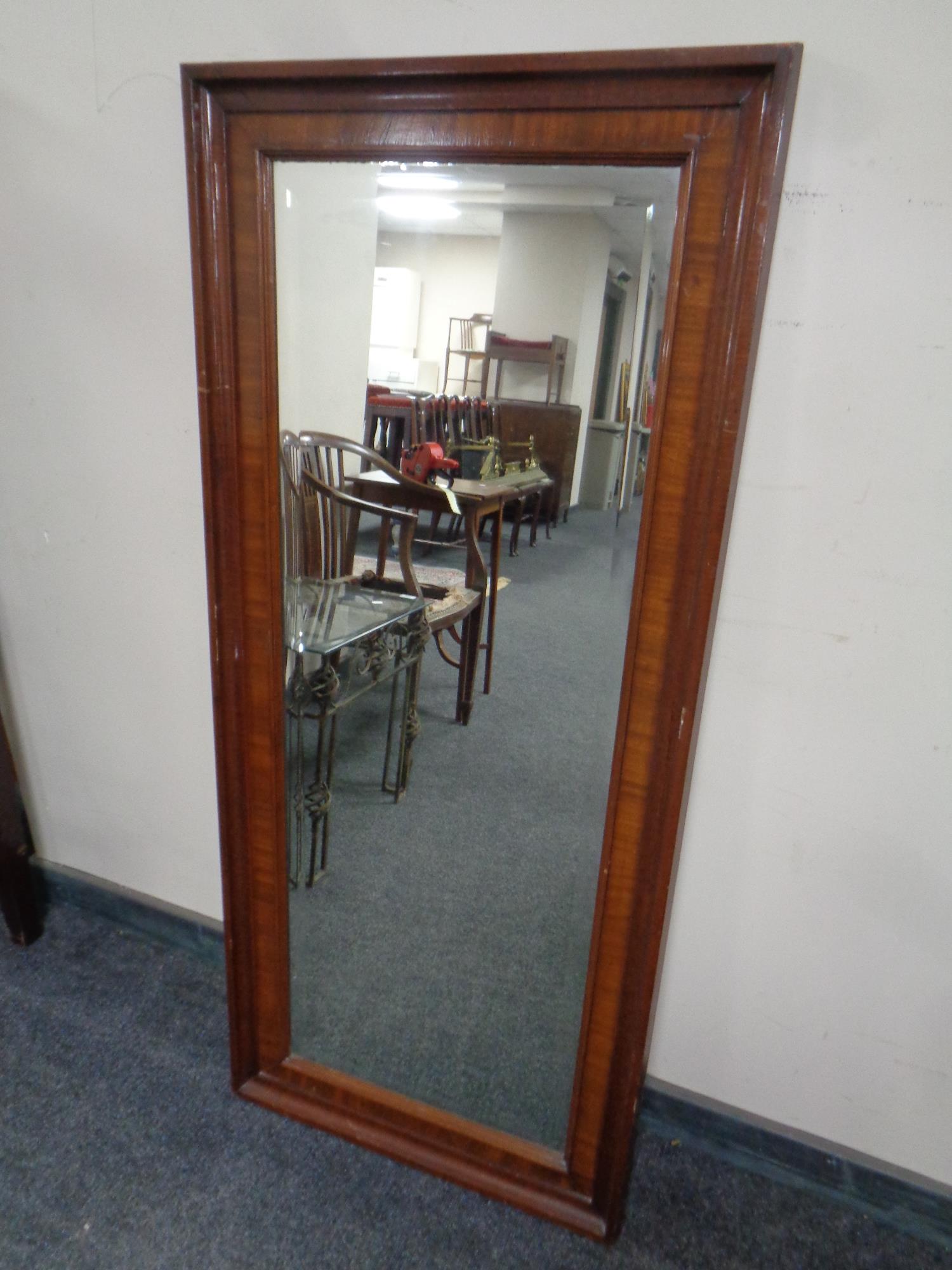 A 19th century continental mahogany framed bevel edged hall mirror.