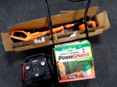 A Lawn Master electric strimmer with accessories, battery and charger,