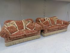 A Barker and Stonehouse three seater settee and two seater settee with loose cushions upholstered