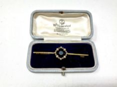 An Edwardian 15ct gold sapphire and seed pearl bar brooch CONDITION REPORT: 3.