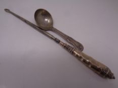A Birmingham silver caddy spoon together with a silver handled button hook