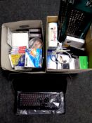 Two boxes containing computer keyboards, BT broadband extender, external hard drives,