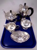 A four piece Sheffield plate tea service together with a silver plated swing handled bon bon dish