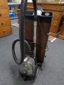 A Beko cylinder vacuum together with a Corby 9000 electric trouser press.