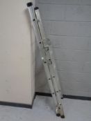 A set of aluminium folding ladders together with a TX-700 tile cutter in case
