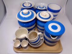 A tray containing eleven pieces of blue and white Cornish ware to include T G Green Chef ware etc