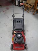 A Mountfield HP454 hand propelled petrol lawn mower with box