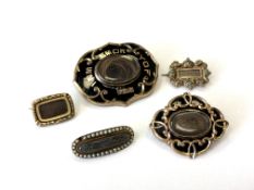 Five 19th century mourning brooches