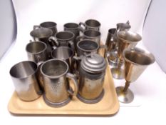 A tray containing a quantity of stainless steel and pouter tankards, goblets,