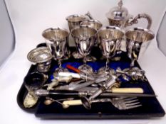 A tray containing antique and later plated wares to include serving set in case,