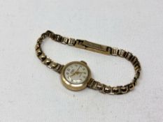 A lady's 9ct gold Bernex wristwatch on 9ct gold bracelet CONDITION REPORT: 11.